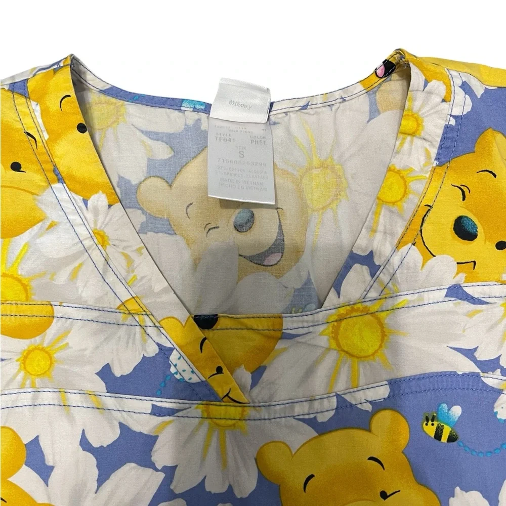 Disney Blue and Yellow Floral Print Adult Woman’s Scrub.
Size S - Picture 5 of 13